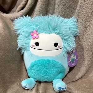 Squishmallows Aqua Plush with Pink Flower Accent